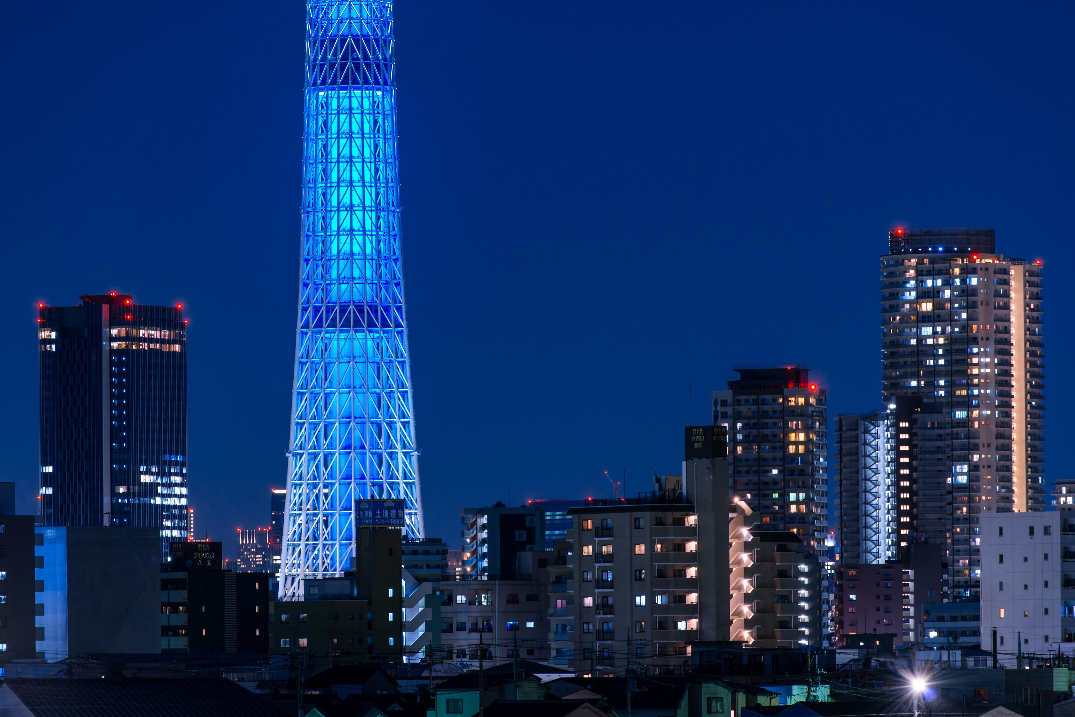 blue lit tower at night
