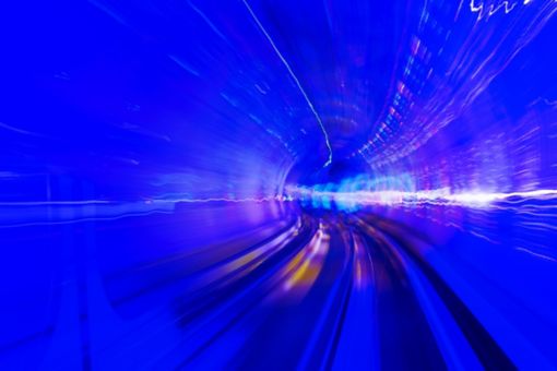 Blurred image of blue tunnel in motion