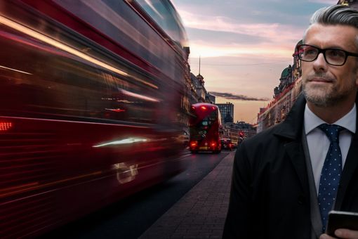 Bus moving man in suit