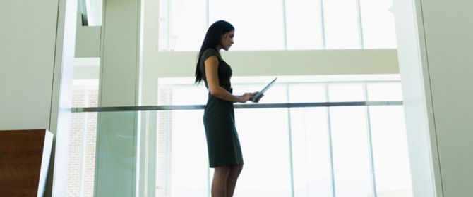 Business woman using tablet