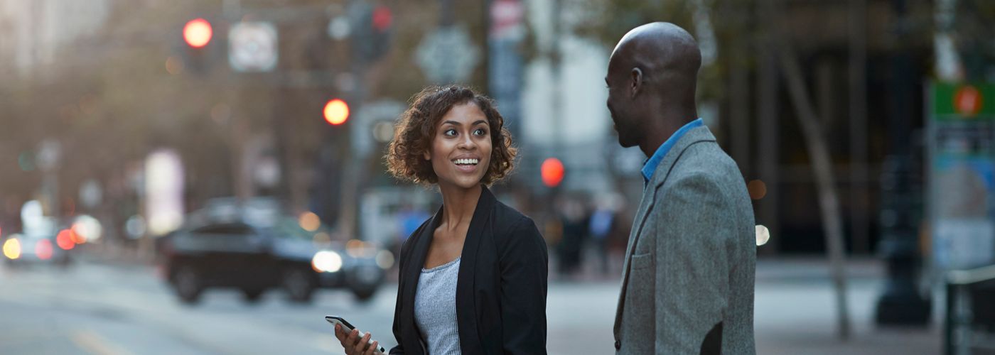 Businesspeople walking and talking on avenue o San Francisco