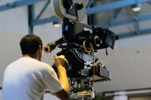 cameraman operating a movie camera