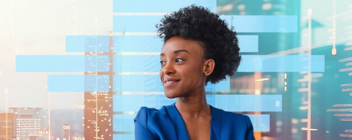 Business woman executive with graph in background