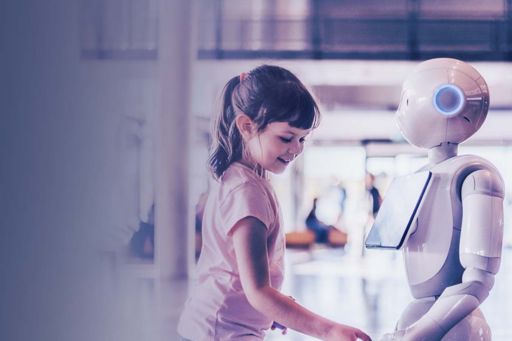 Child reaching for robot's hand