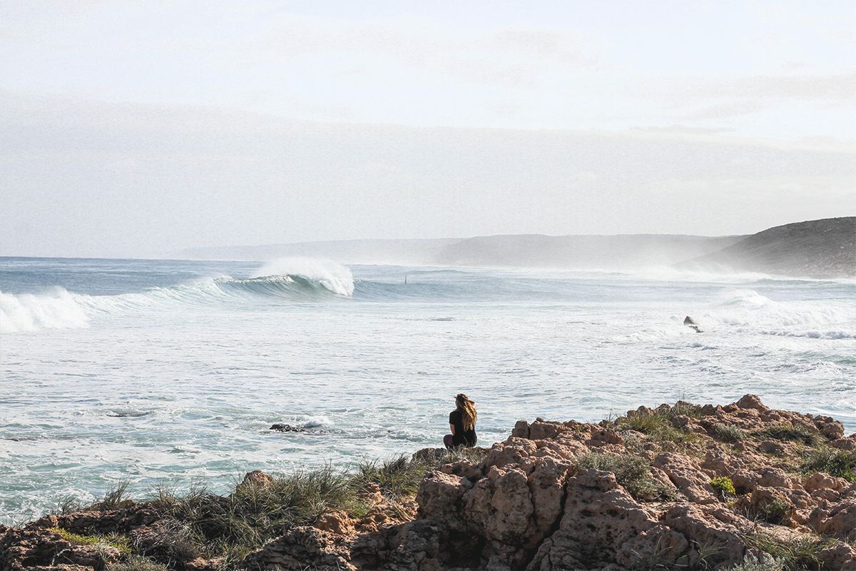 woman watching waves