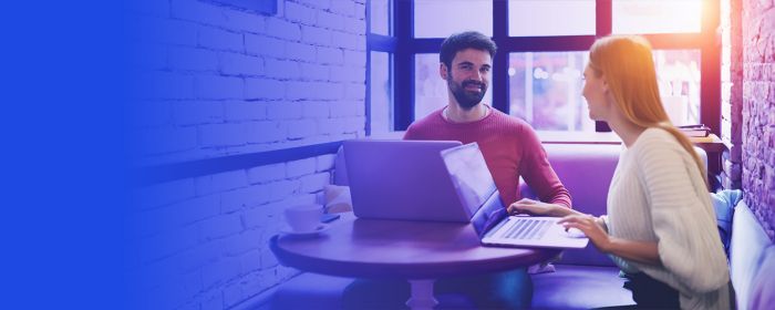 colleagues working together in cafe banner
