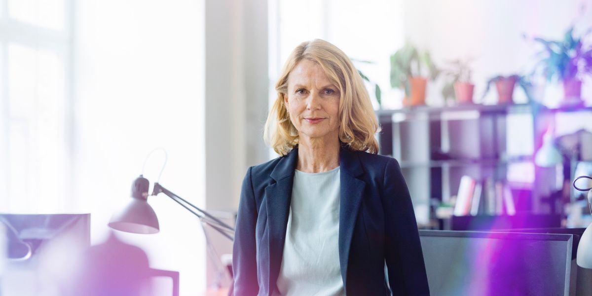 Top 5 Issues Facing Australian Business Leaders In 2024 KPMG Australia   Confident Australian Businesswoman Standing By An Office Desk Cq5dam.web.1200.600