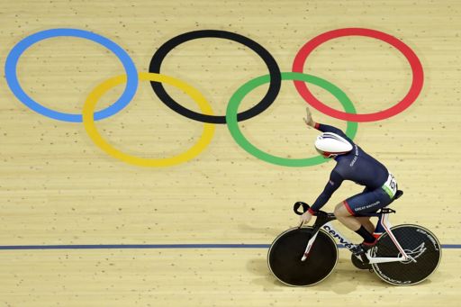 Cyclist over olympic rings