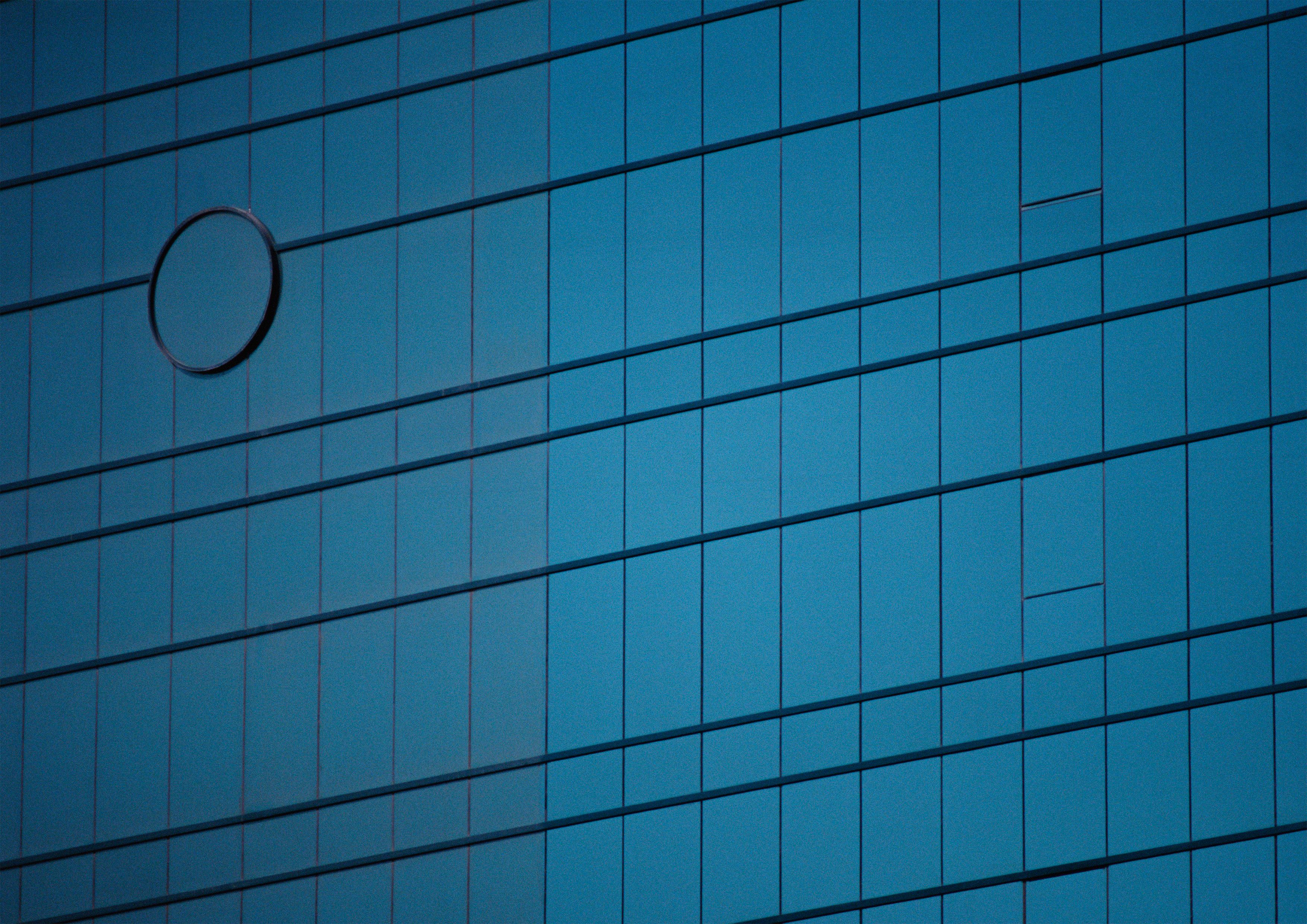dark blue glass office building