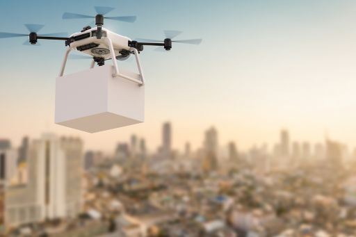 Delivery drone flying in city