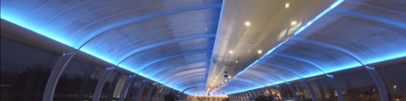 A long tunnel lit with blue light