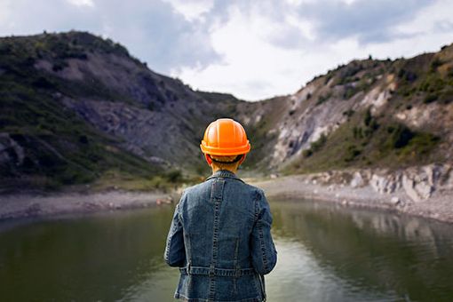 Engineer looking at the lake