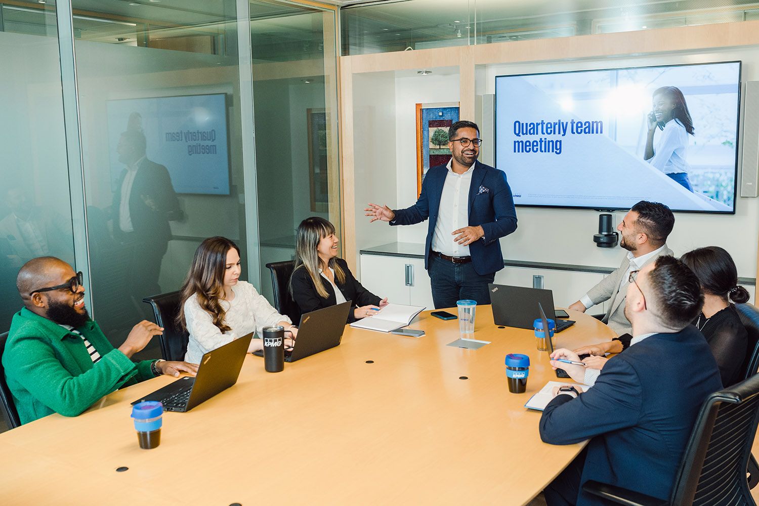 KPMG business professionals meeting in a boardroom