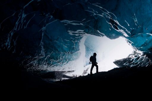 Explorer in ice cave