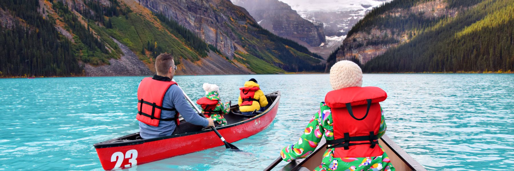 Family of 4 on a canoeing trip