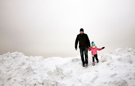 Father and child on snow