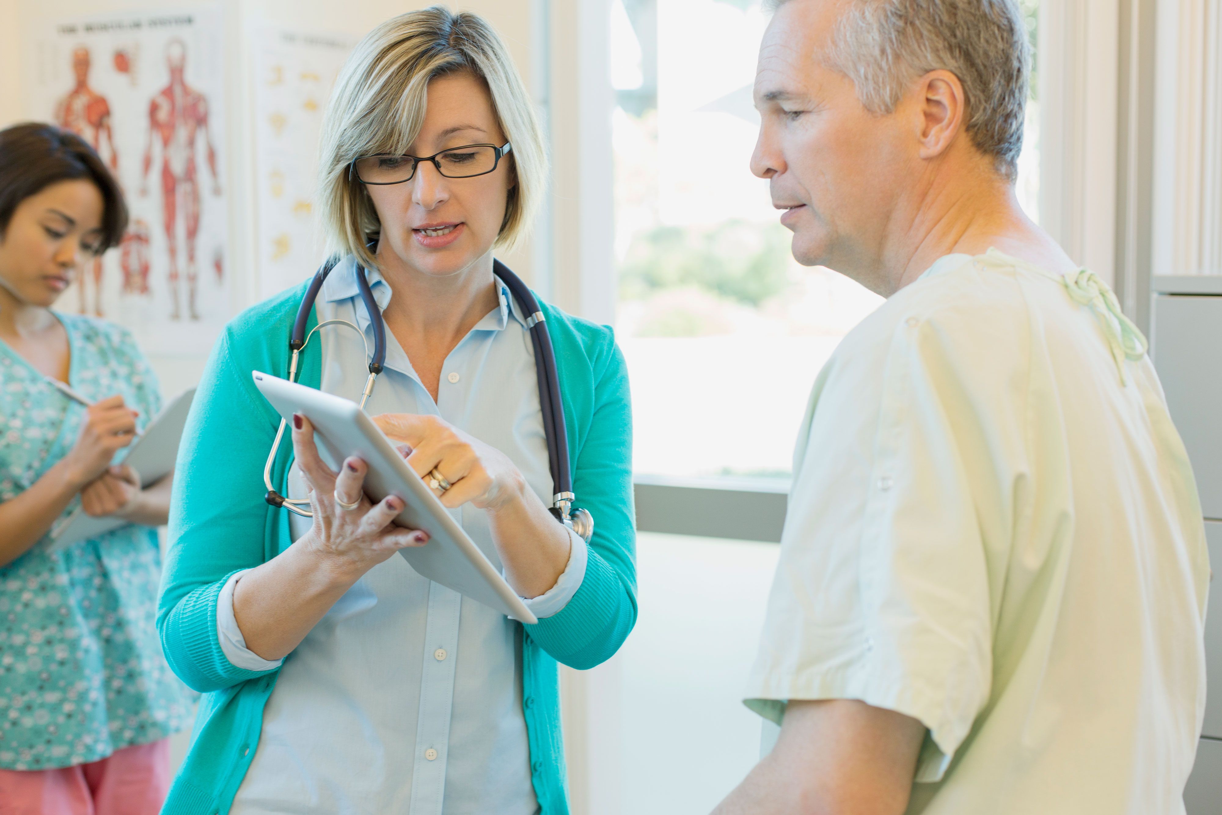 healthcare worker aiding a patient