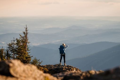 Female hiker looking at hills