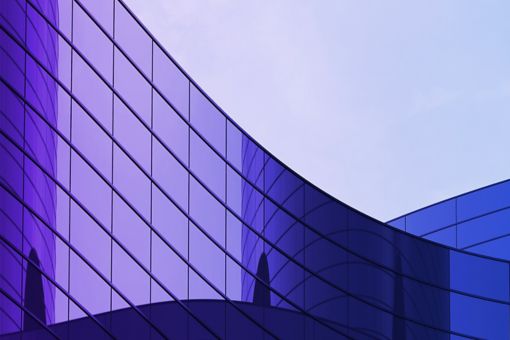 Financial Crime - Man with bag climbing stairs purple background