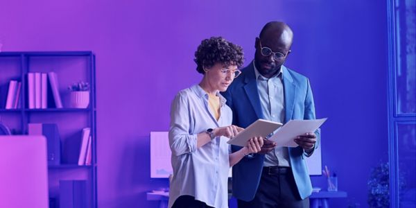 financial-services-two-people-looking-in-the-phone