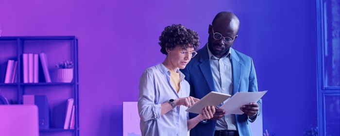 financial-services-two-people-looking-in-the-phone