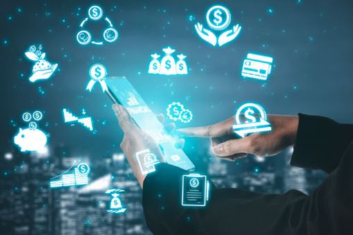 woman-in-green-shirt--paying-with-credit-card-on-tablet