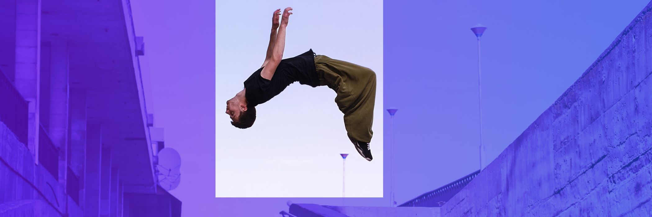 freerunner performing backflip