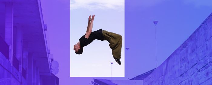freerunner performing backflip