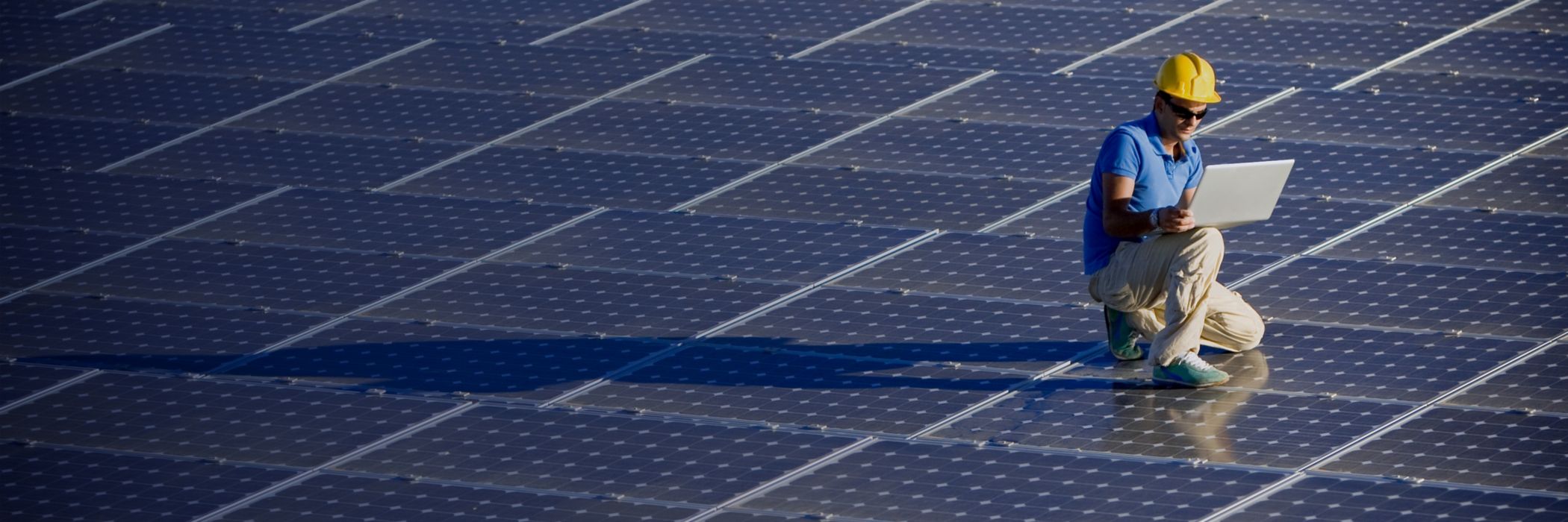 Frontline engineer gathering data from solar panels