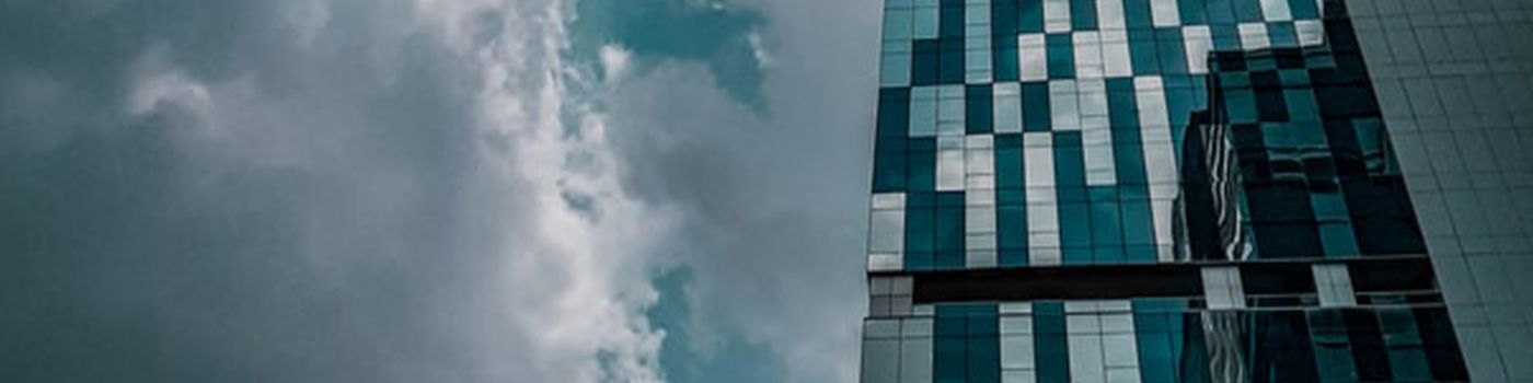 Glass building and clouds