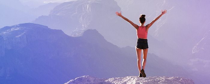Woman standing on mountains