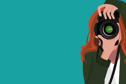 Girl using camera on green background