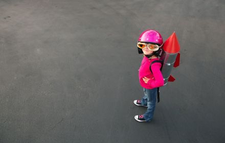 girl wearing a pink helmet