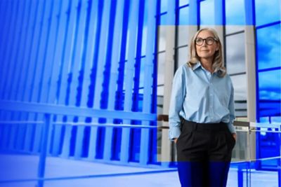 Woman showing tablet to a man