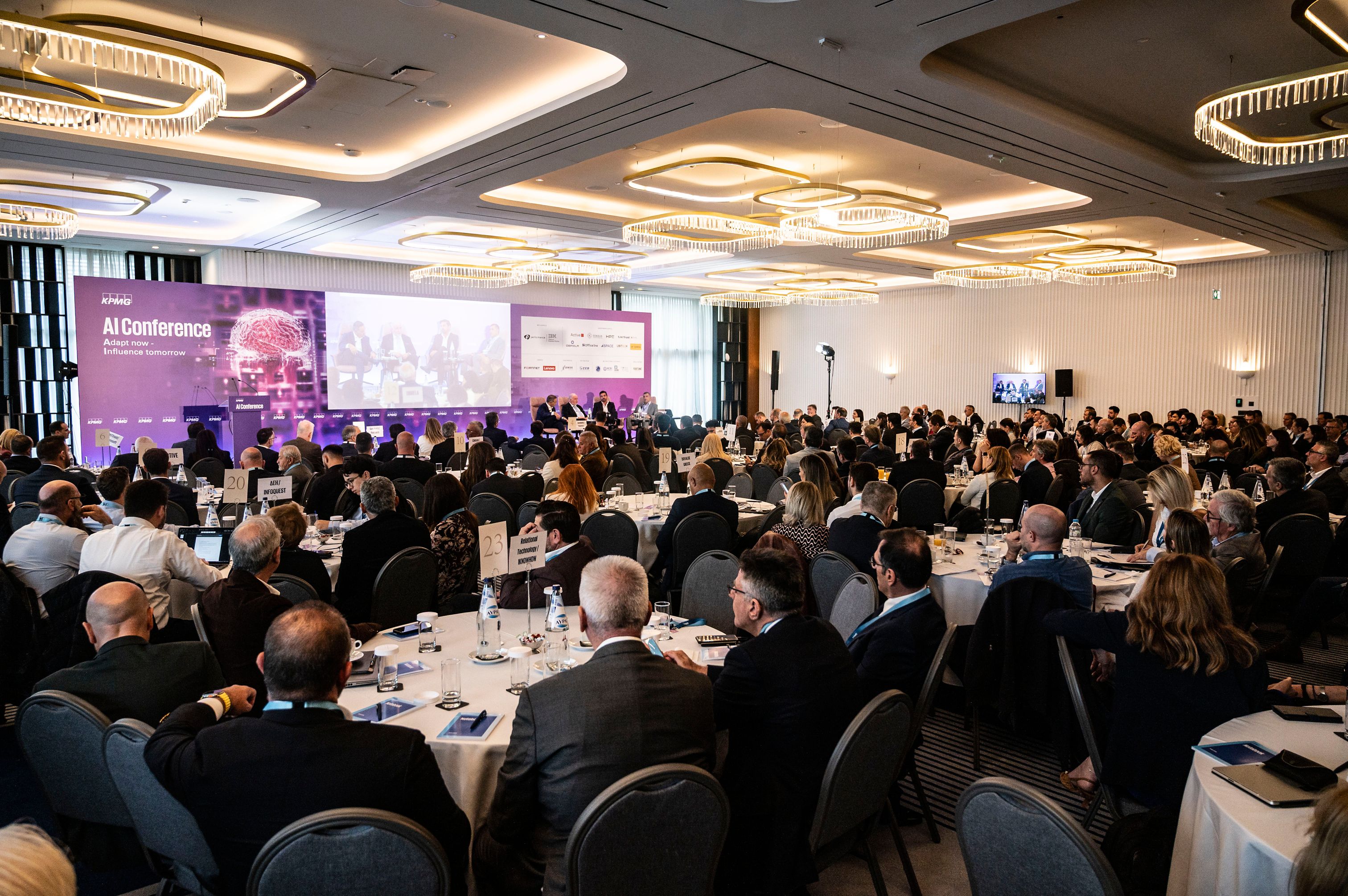 people attending the ai conference by kpmg in greece