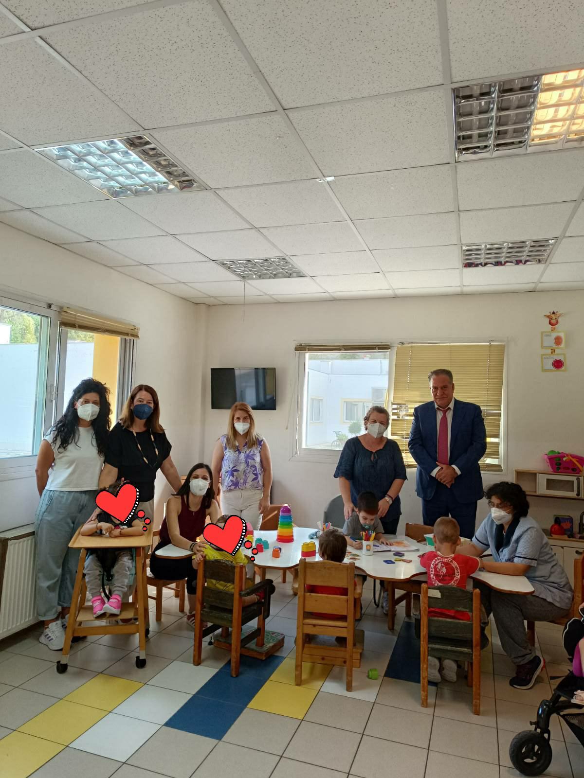 kpmg employees offer books to the children at elepap thessaloniki
