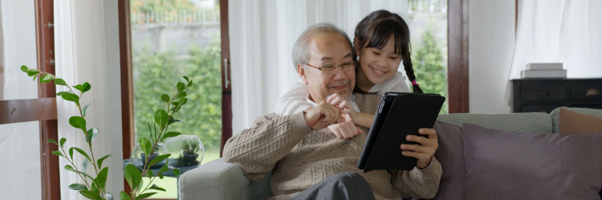 person interacting with smartwatch in forest