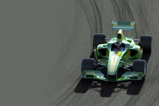 Green race car on a race track