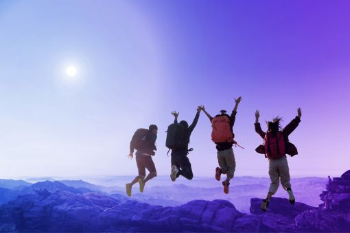 group of hikers jumping