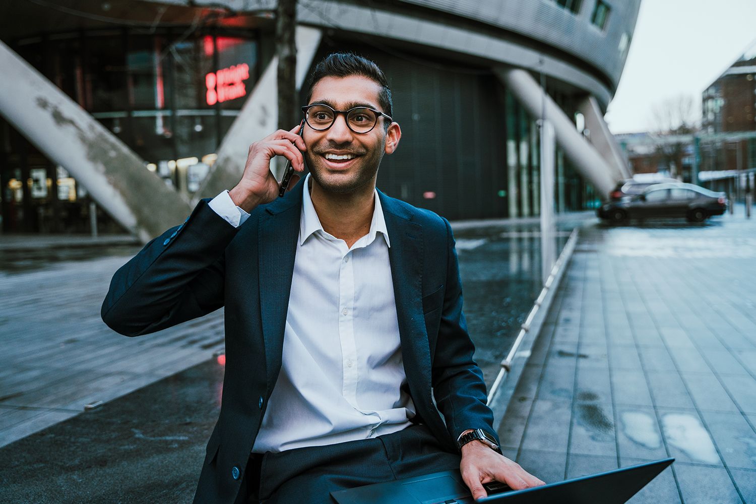 Happy businessman talking