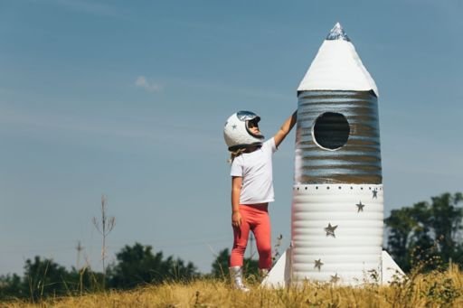 Happy child dressed as an astronaut