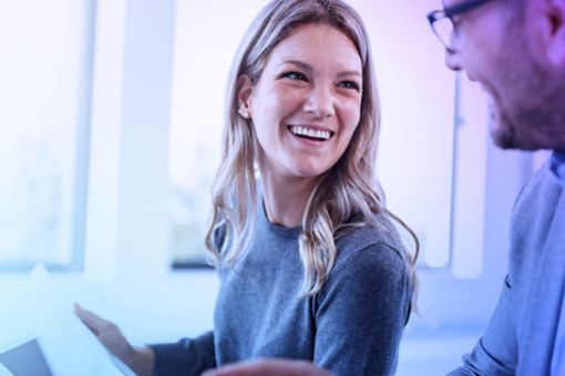 Happy economists working in the office