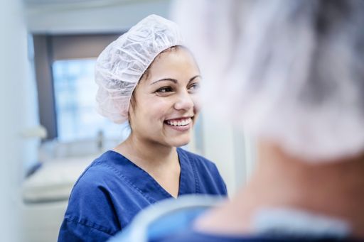 young female surgeon in hospital smiling