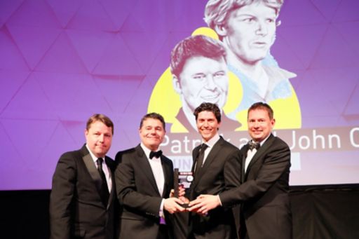 Don O'Leary accepts the Business Person of the Year award on behalf of Patrick and John Collison of Stripe from KPMG’s Seamus Hand (right), Minister for Finance and Public Expenditure and Reform, Paschal Donohoe TD, and The Irish Times Business Editor, Ciarán Hancock.