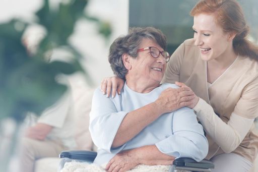 Older lady and nurse in nursing home