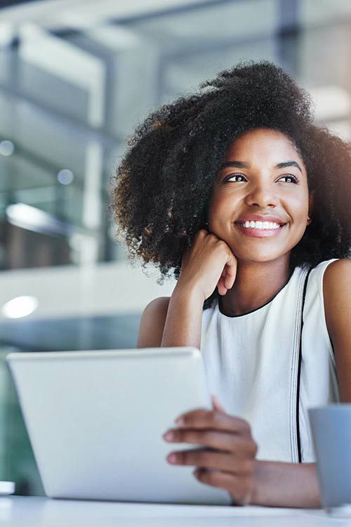 Smiling woman gazing into distance