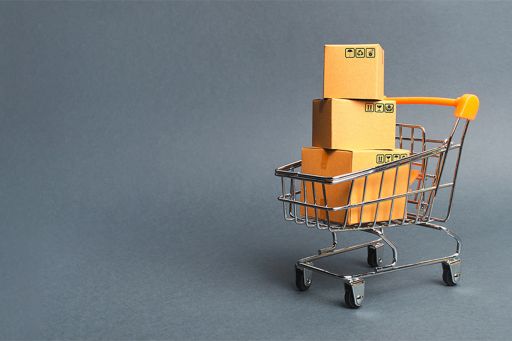 Shopping trolley containing cardboard boxes