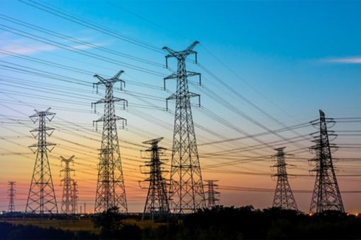 high-voltage power lines at sunset,high voltage electric transmission tower