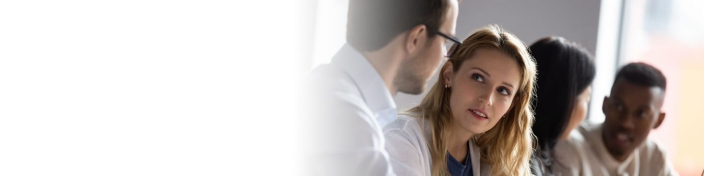 Four colleagues in a meeting