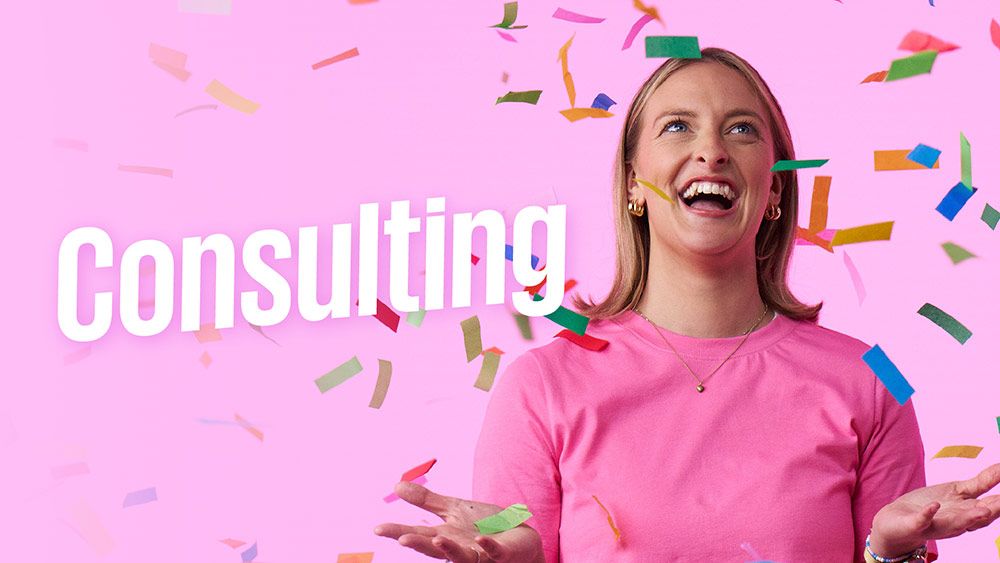 consulting grad on confetti background